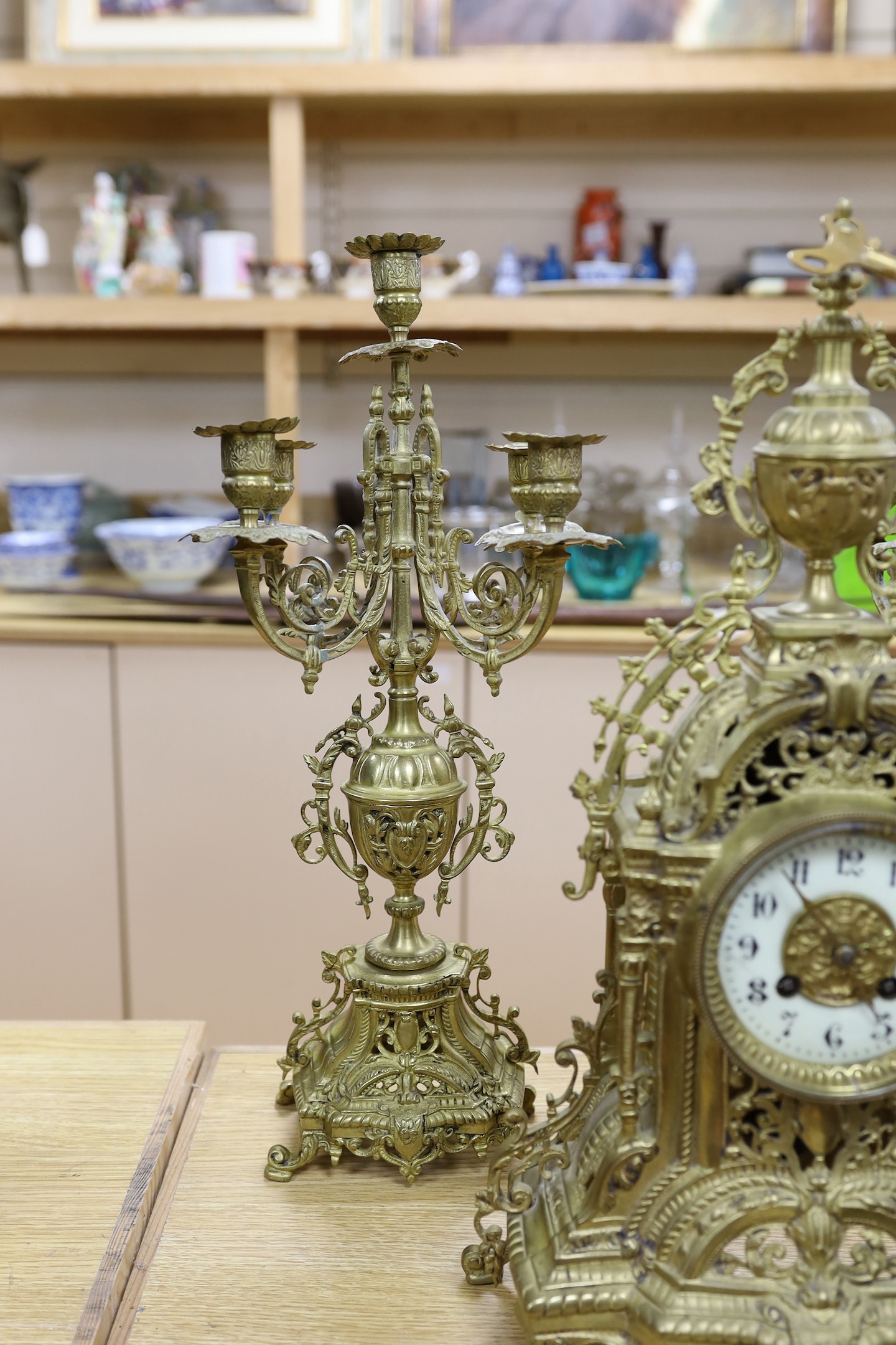 A French brass clock garniture c.1900, Japy Freres movement. 48cm high